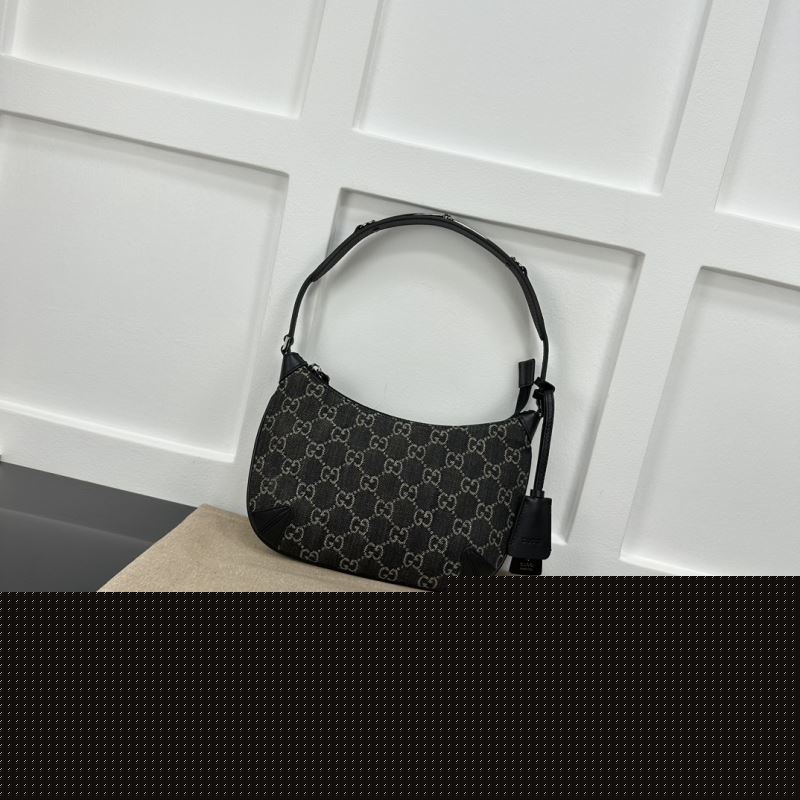 G*u*i top handle bags